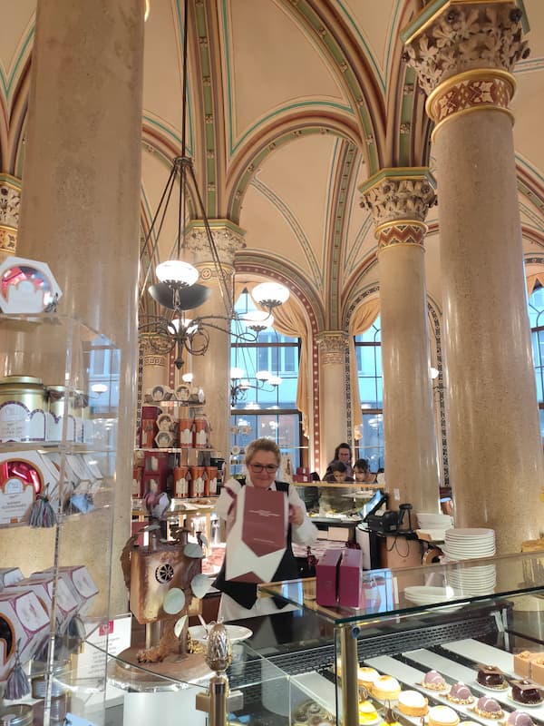 waitress attending the cafeteria at Vienna's Cafe Central